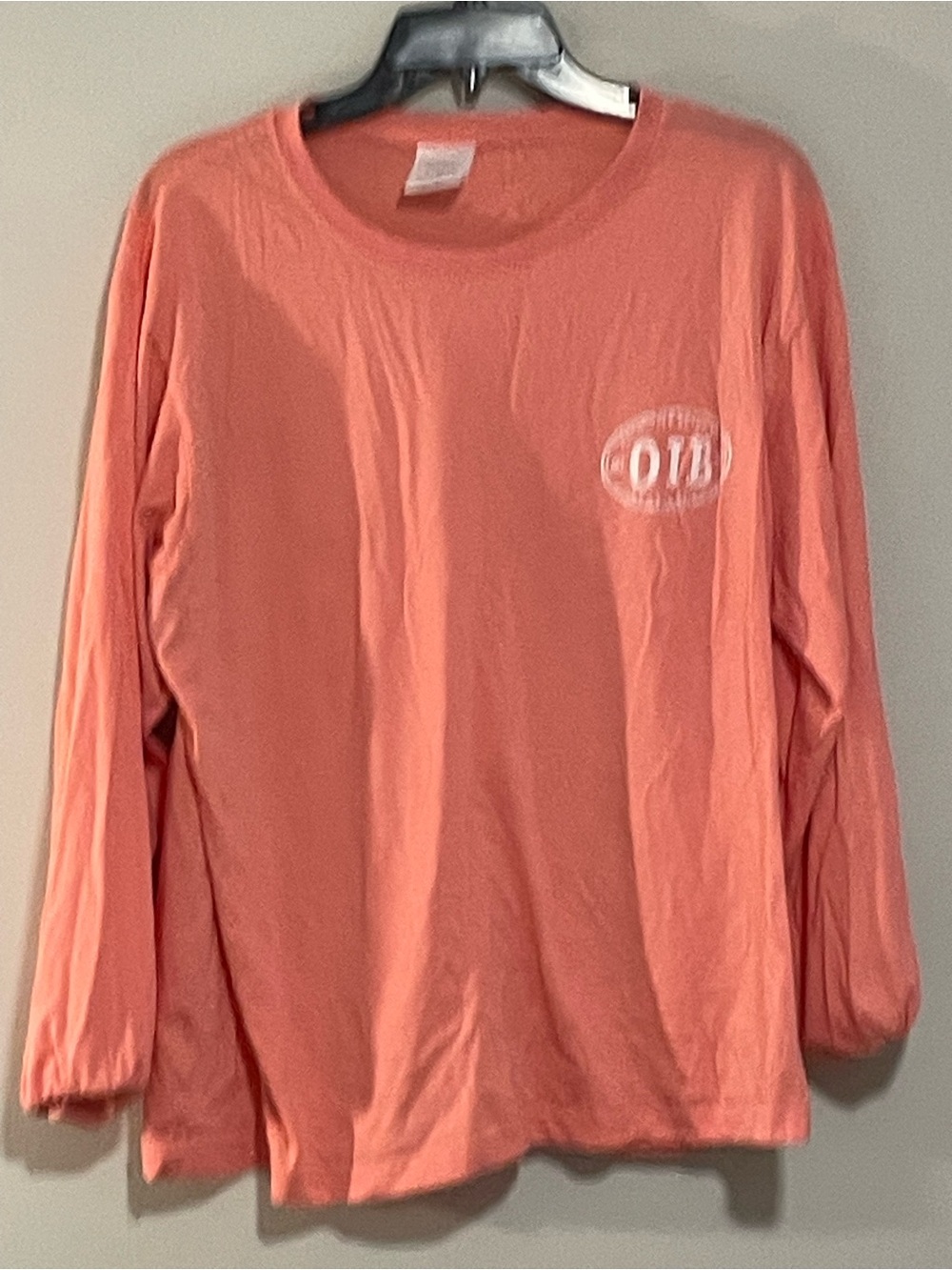 Men's Coral Long-Sleeve Tee with Chest Logo. Item # 11546